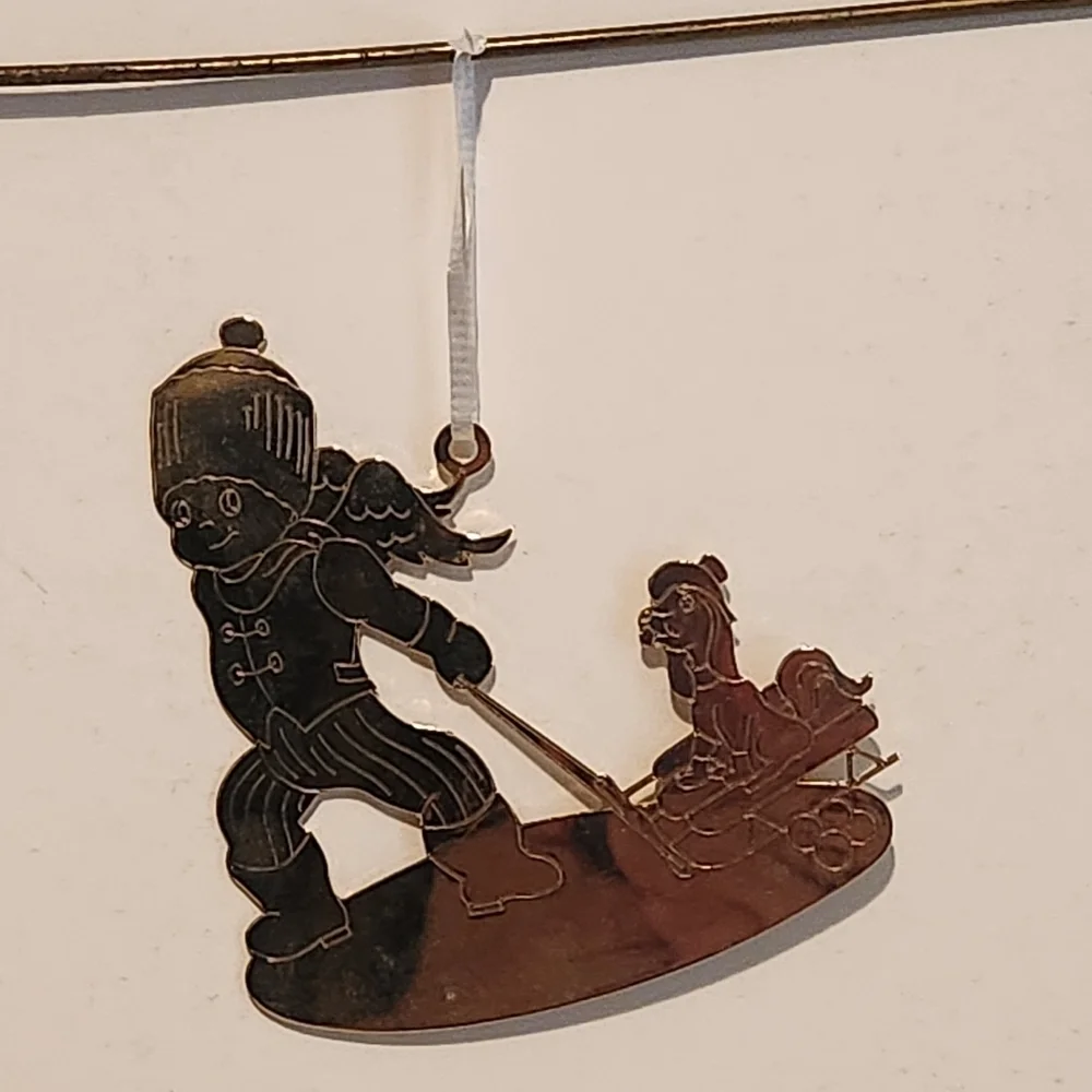 3 1/4” Vintage 1979 Pressed Brass Christmas Ornament Angel pulling Dog on Sled